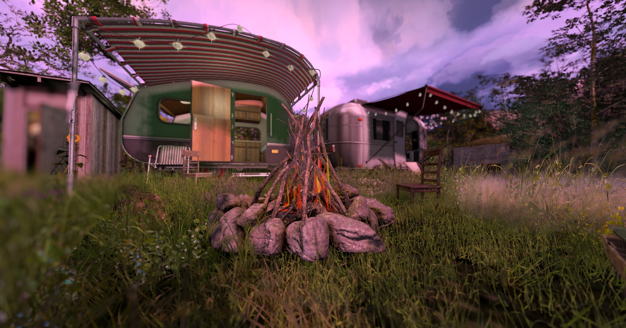 Campfire and trailers at the Ofrenda campsite